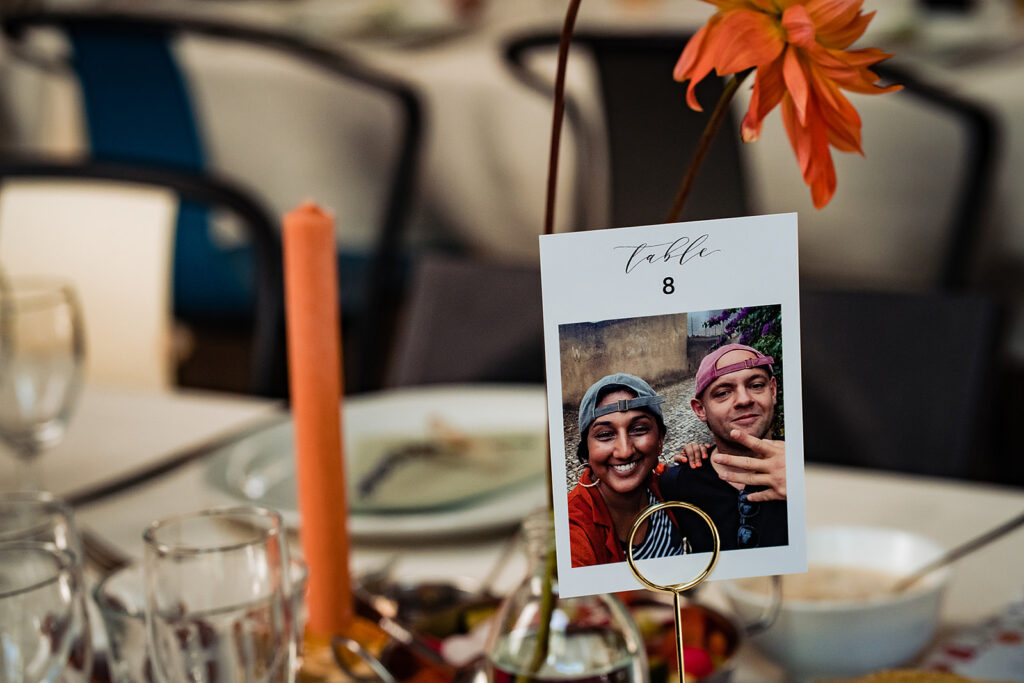 Polaroid photo prints as table numbers placements at reception wedding breakfast meal